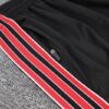 Manchester United 2025/26 Training Tracksuit Black & Red 1/4 Zip– Adult & Kids Set