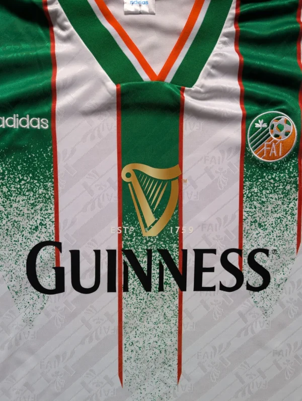 66a33bea38cef4d21265d351db2ce1375fd4fdd7096fdba60289f3c1519746e3 Ireland 1994 Away Retro X Guinness Jersey