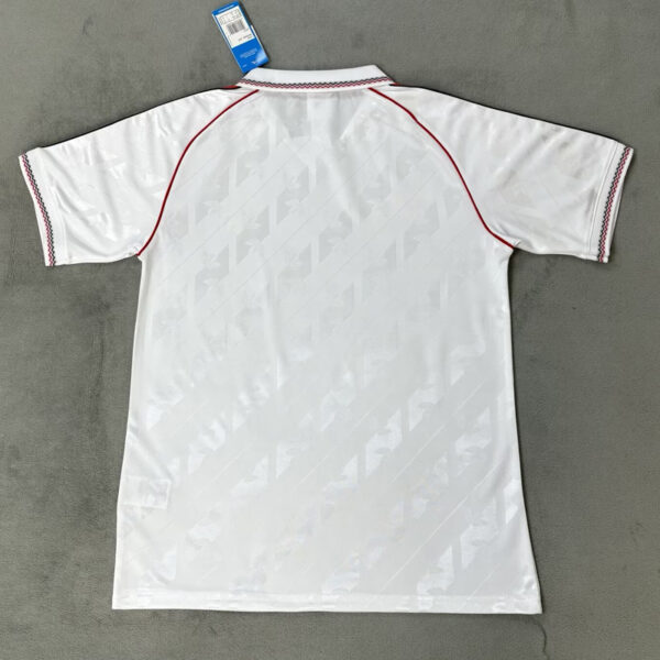 90e5d73ad83bb83996c2bc994d293d97fd93e6404ba5c00a91592ae2d31069f6 Manchester United X Guinness Jersey